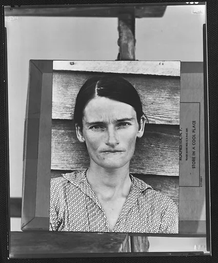 [Copy of Print of "Alabama Cotton Tenant Farmer Wife" (Allie Mae Burroughs) Mounted on Makeshift Easel]