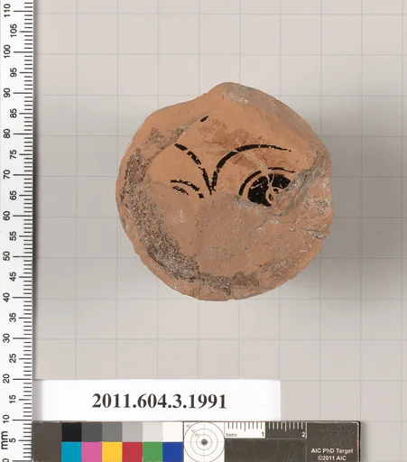 Terracotta fragment of a kylix (drinking cup)