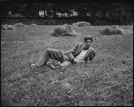 [Cass Canfield, Jr. Lying in Field, Bedford, New York]