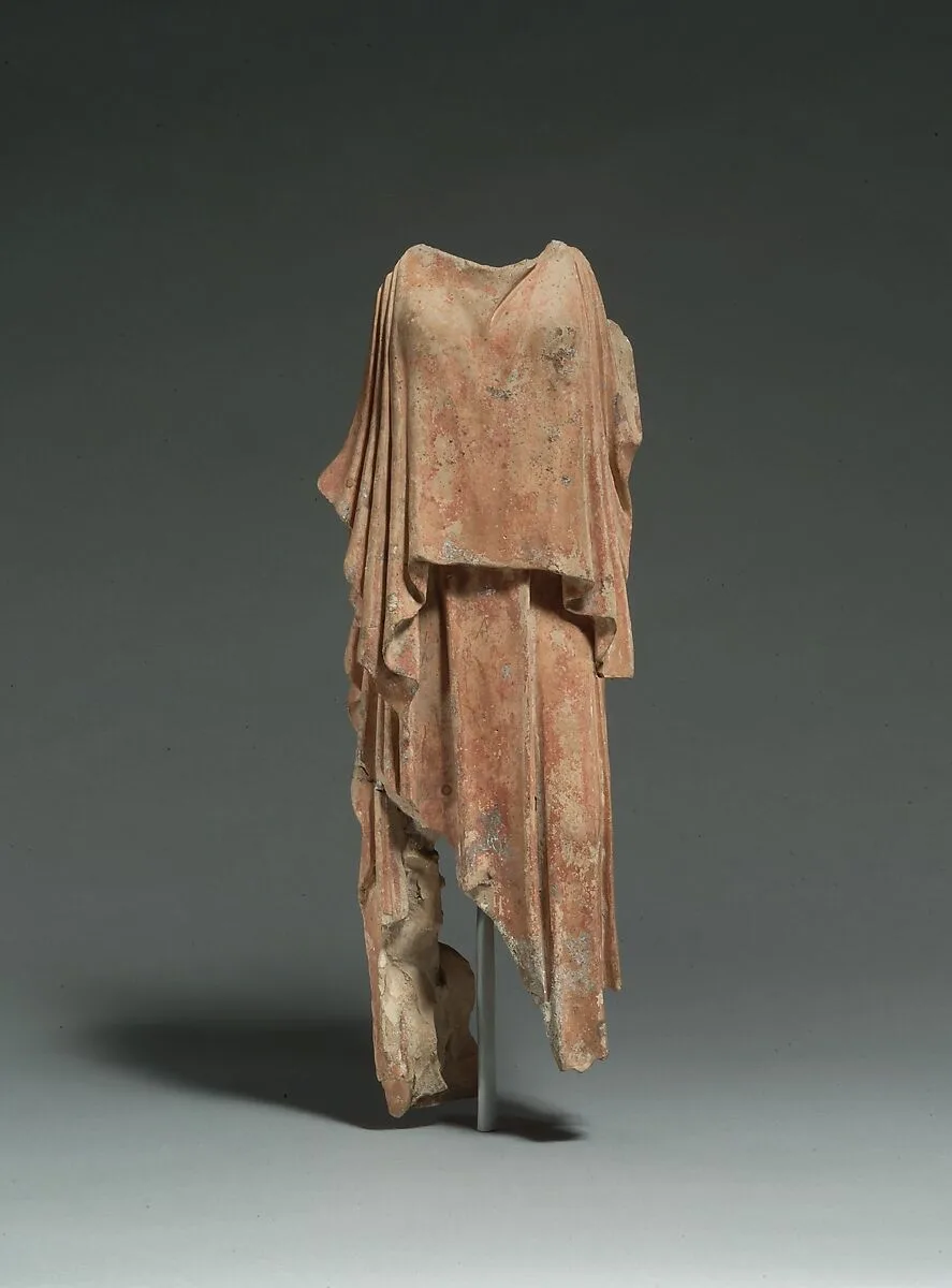 Terracotta figure of a woman — Unknown