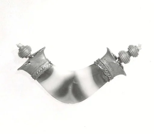 Part of a necklace: pendant and beads