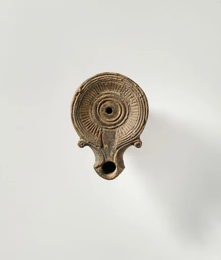 Terracotta oil lamp