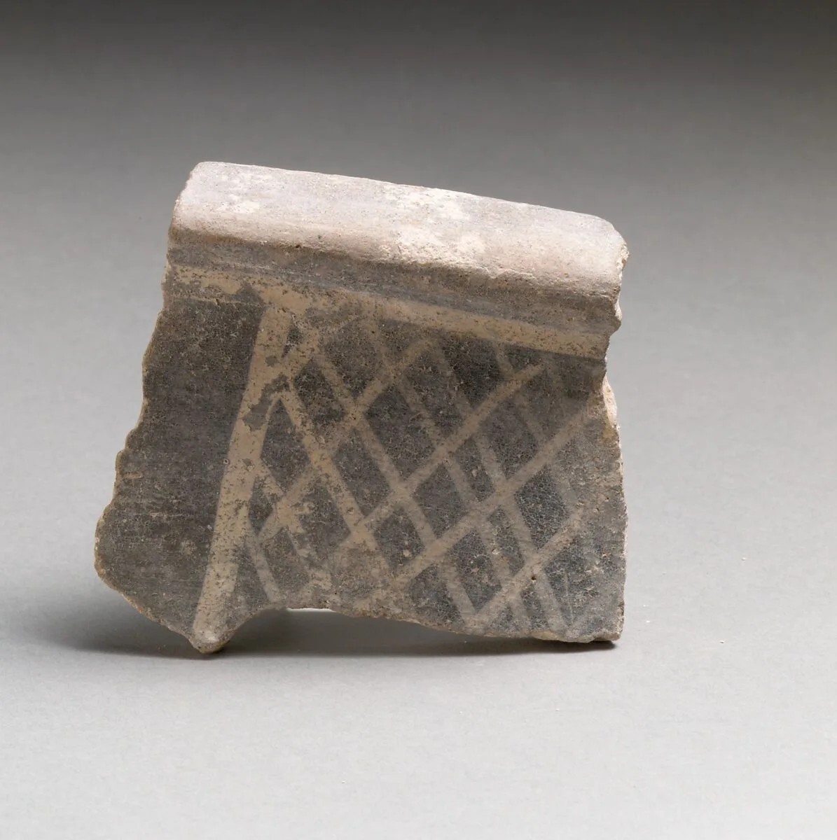 Terracotta rim fragment with cross-hatching — Unknown