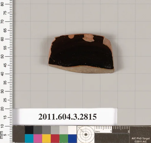 Terracotta fragment of a lid?