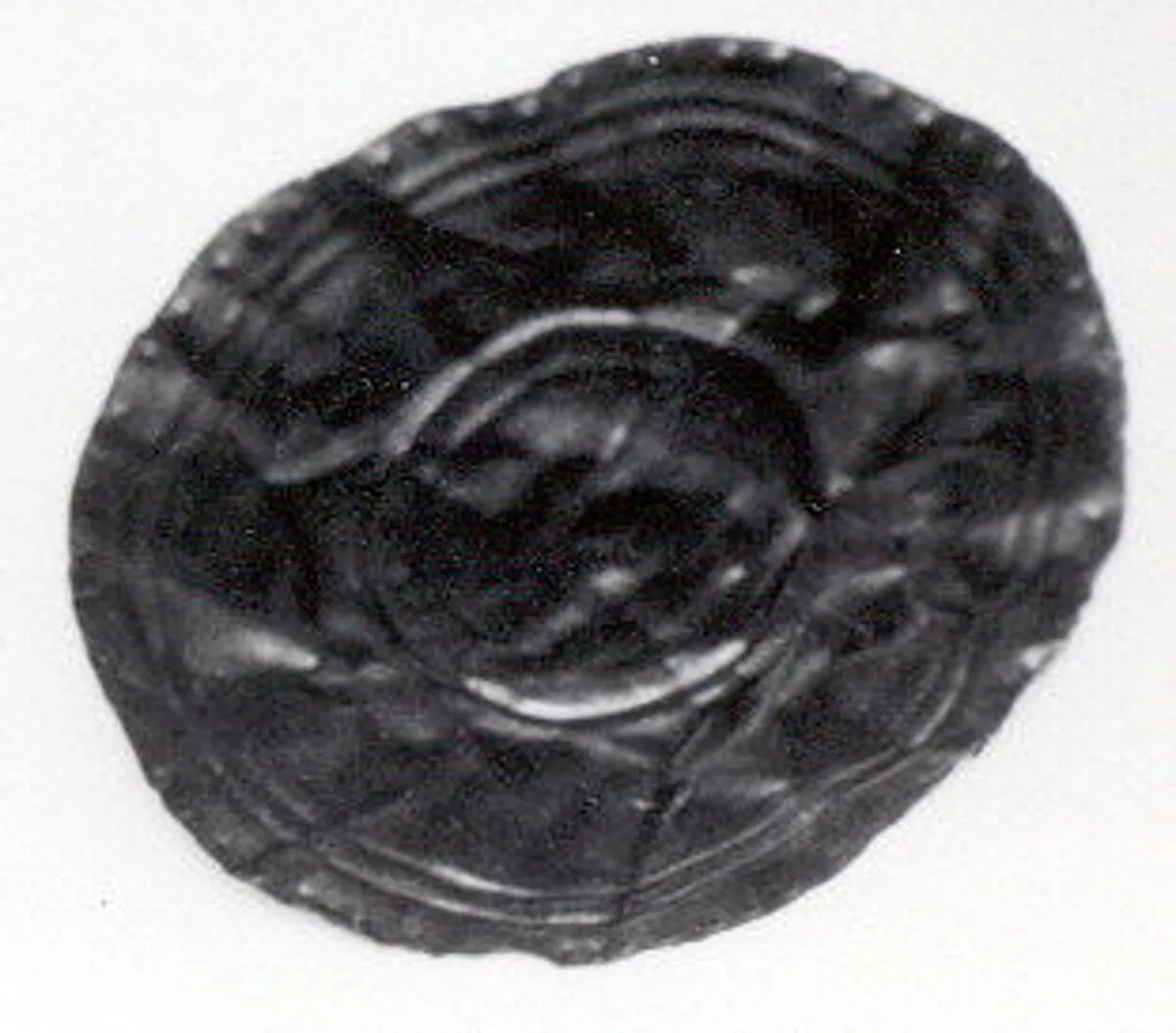 Disk ornament — Unknown