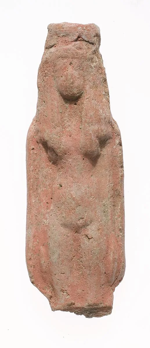 Standing female figurine square headdress, missing most of her legs — Unknown