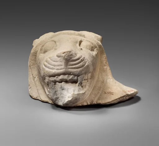 Limestone head of a lion from a votive stele (?)
