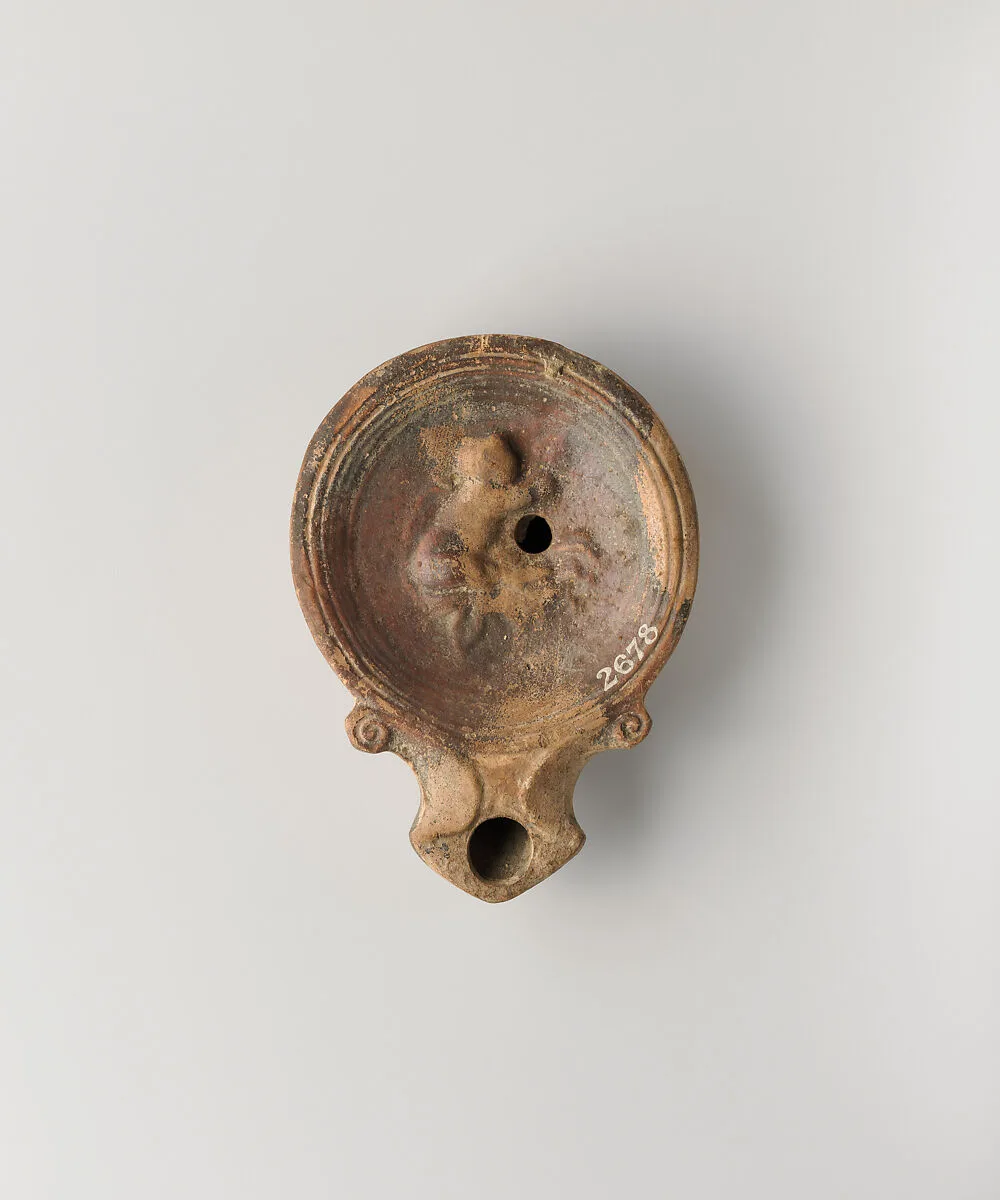 Terracotta oil lamp — Unknown