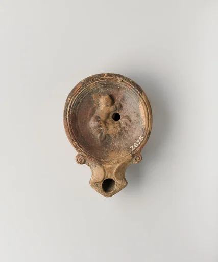 Terracotta oil lamp
