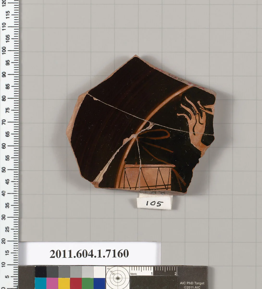 Terracotta fragment of a kylix (drinking cup) — Makron