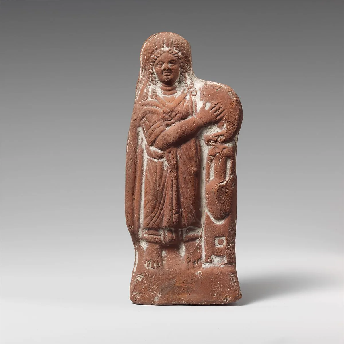 Terracotta statuette of a woman with tympanum — Unknown