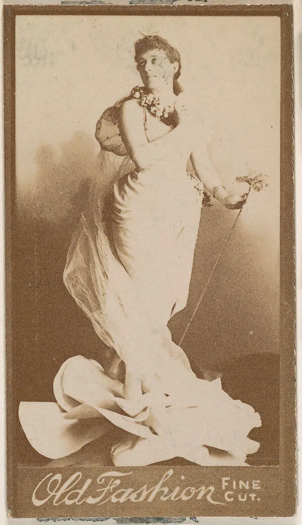 Actress holding metal staff, from the Actresses series (N664) promoting Old Fashion Fine Cut Tobacco — Unknown