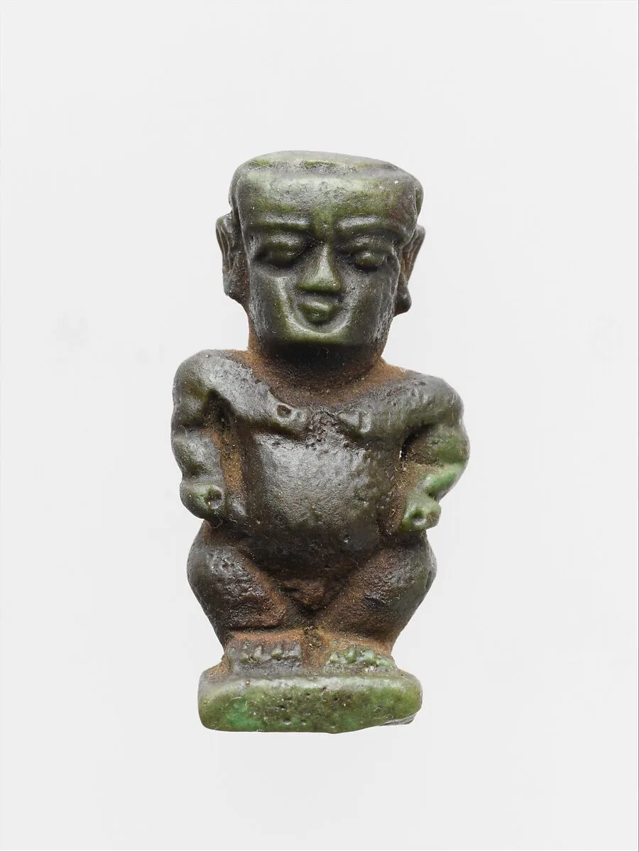 Faience amulet in the form of the dwarf god Pataikos — Unknown