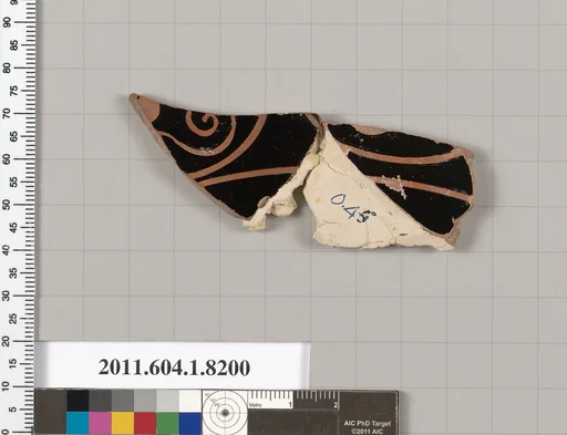 Terracotta fragment of a kylix (drinking cup)