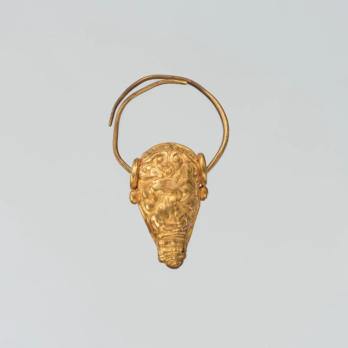 Gold earring with head of a bull — Unknown
