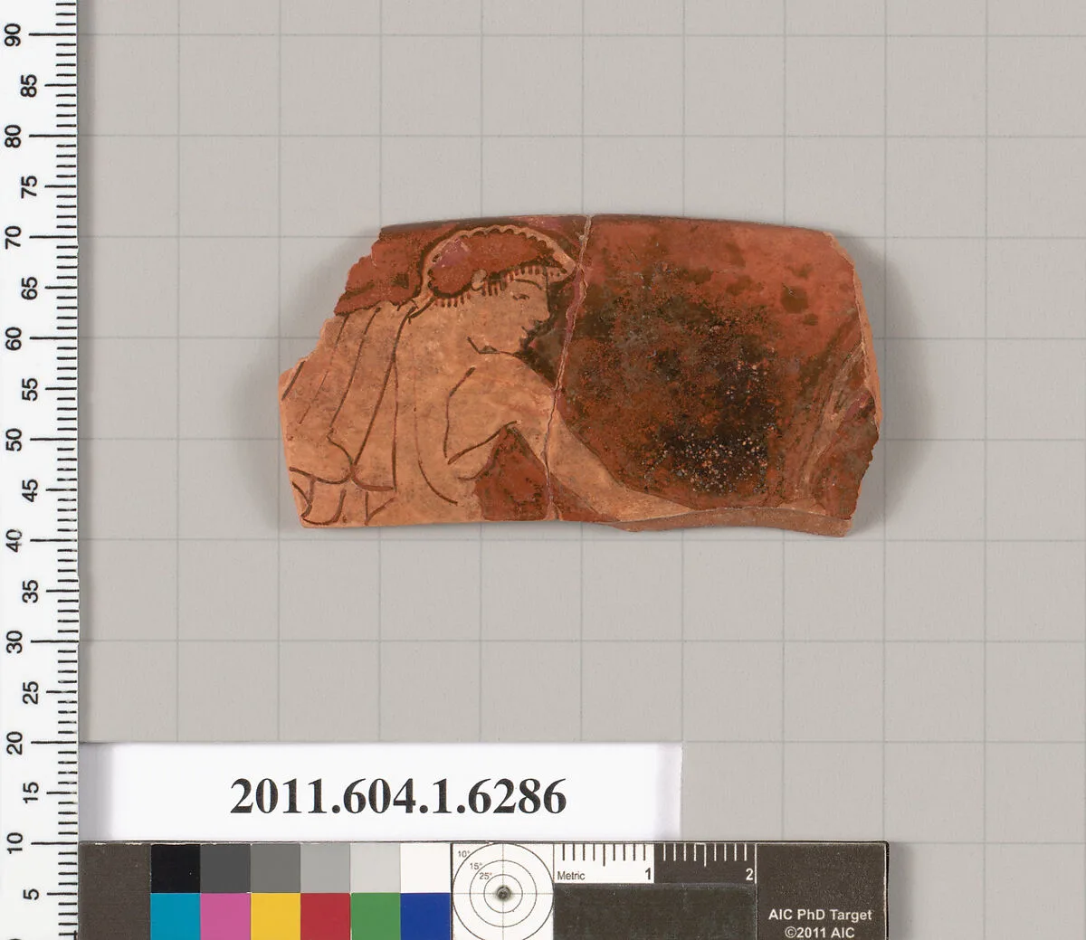 Terracotta rim fragment of a kylix (drinking cup) — Onesimos