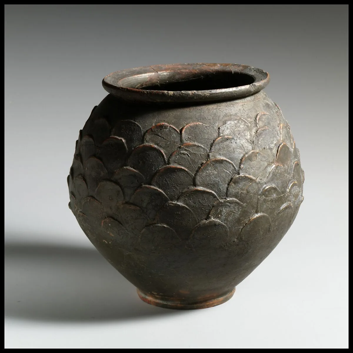 Terracotta jar with barbotine decoration — Unknown