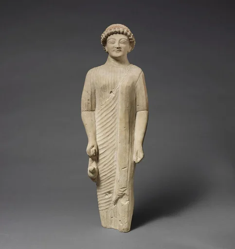 Limestone statuette of a beardless male votary with a fillet