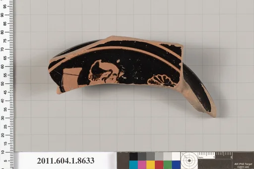 Terracotta fragment of a stemless kylix (drinking cup)