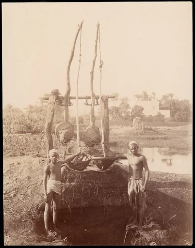 [Two Boys Beside a Well]