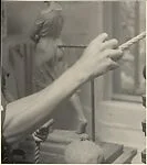 [Male Model Posed Pulling a Rope in Anna Huntington's Rooftop Studio]