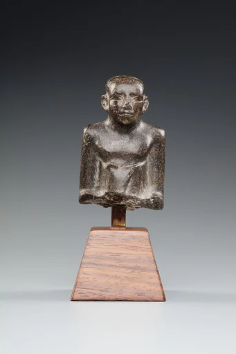 Upper Part of a Seated Figure in a Long Kilt