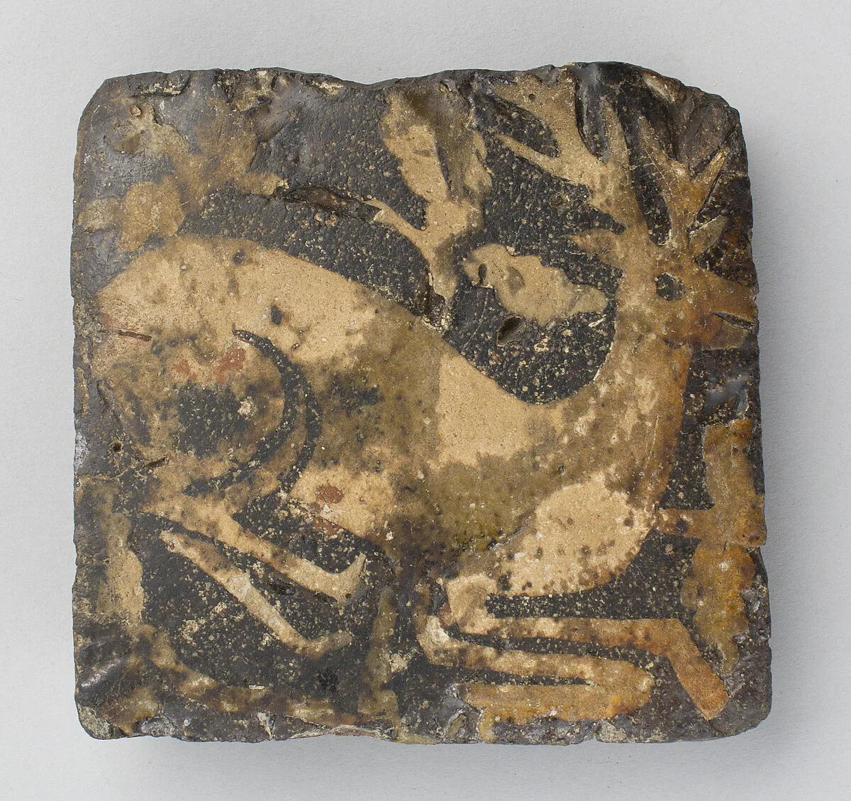 Tile with kneeling hart — Unknown