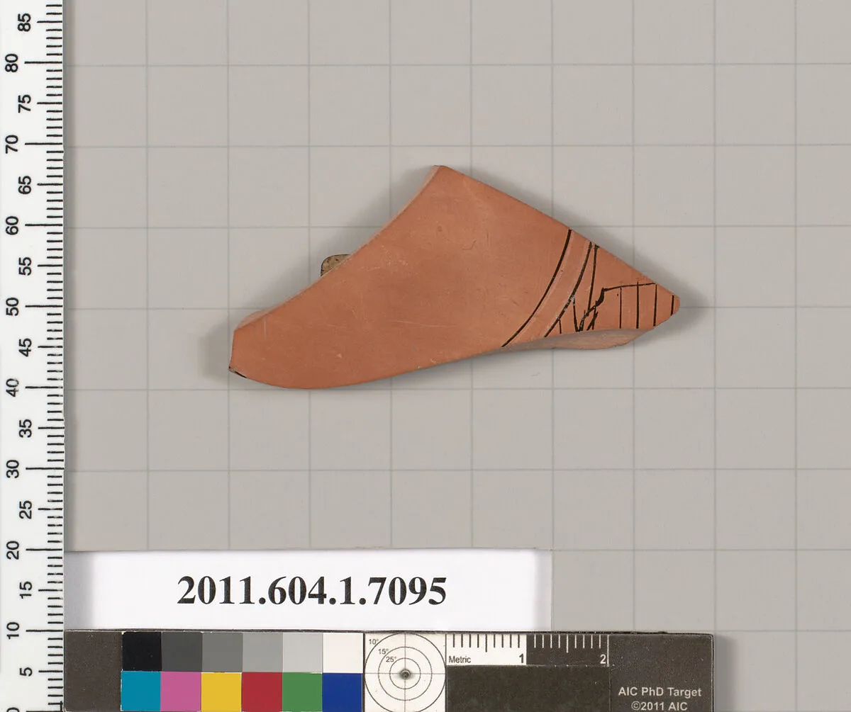 Terracotta fragment of a kylix (drinking cup) — Douris