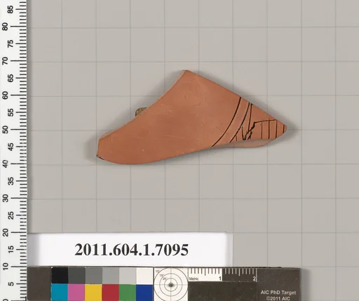 Terracotta fragment of a kylix (drinking cup)