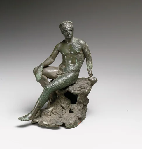 Bronze statuette of Hermes seated on a rock