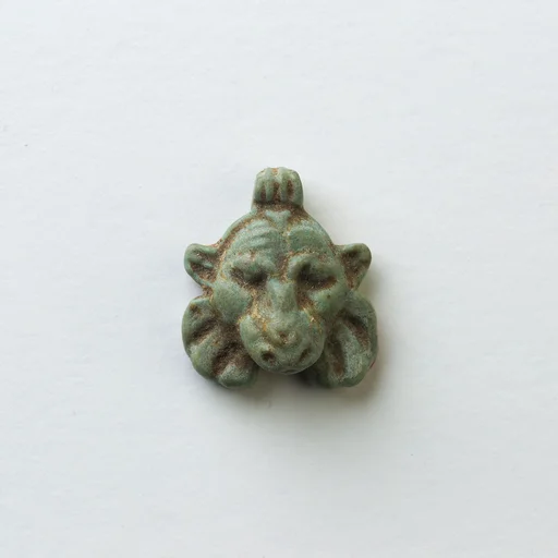 Lion head amulet