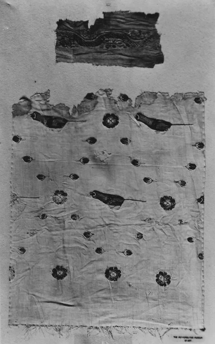 Fragment of a Tunic with a Serpent Motif Shoulder Band — Unknown