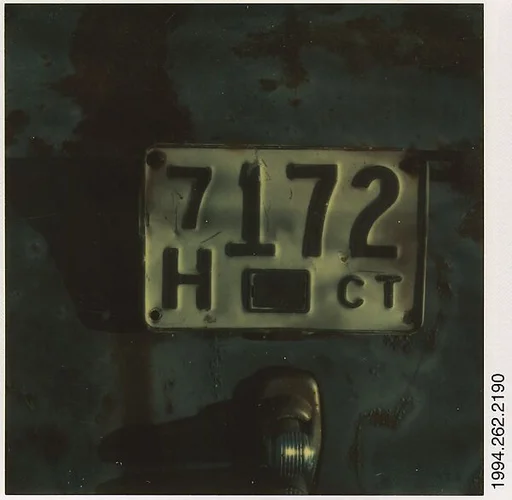 [Detail of Junked Automobile: Connecticut License Plate]