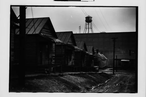 [Five 35mm Film Frames: Wooden Company Houses, Horice's Fish Market, Southeastern U.S.]