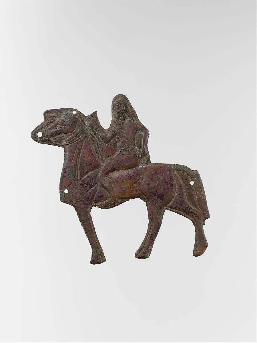 Plaque depicting a horse and rider — Unknown