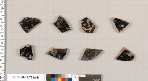 Terracotta fragments of kylikes (drinking cups)