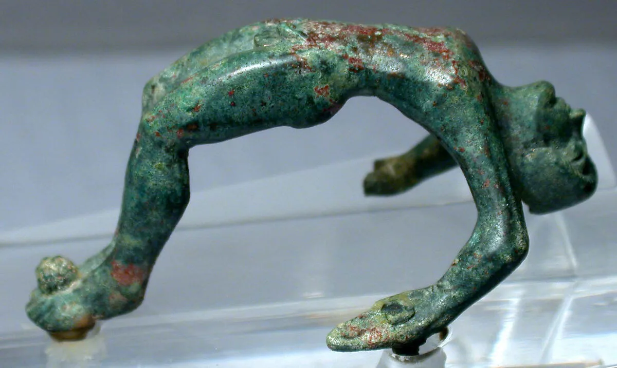 Bronze handle of a cista with nude youth — Unknown