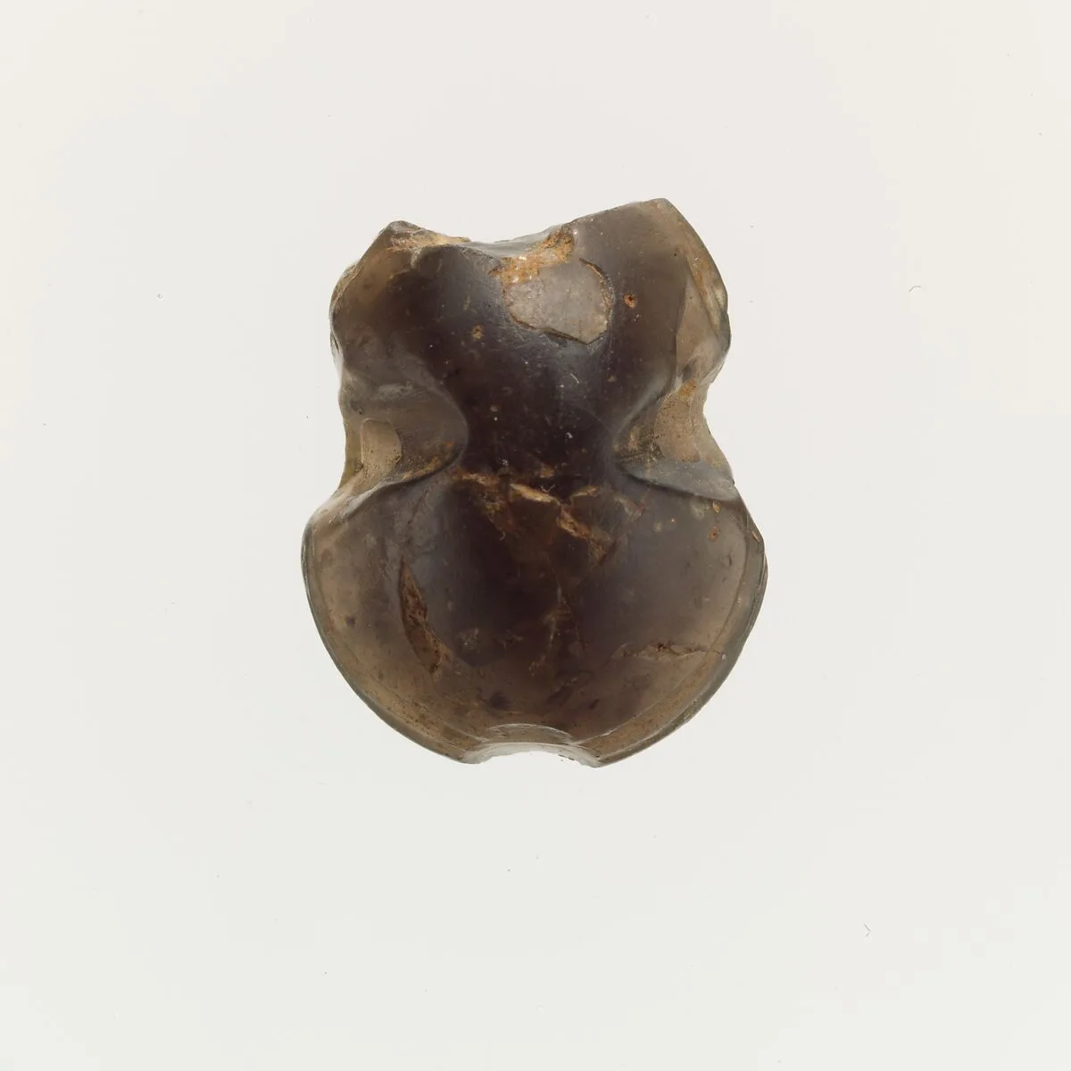 Obsidian bead in the form of of a figure-of-eight shield — Unknown