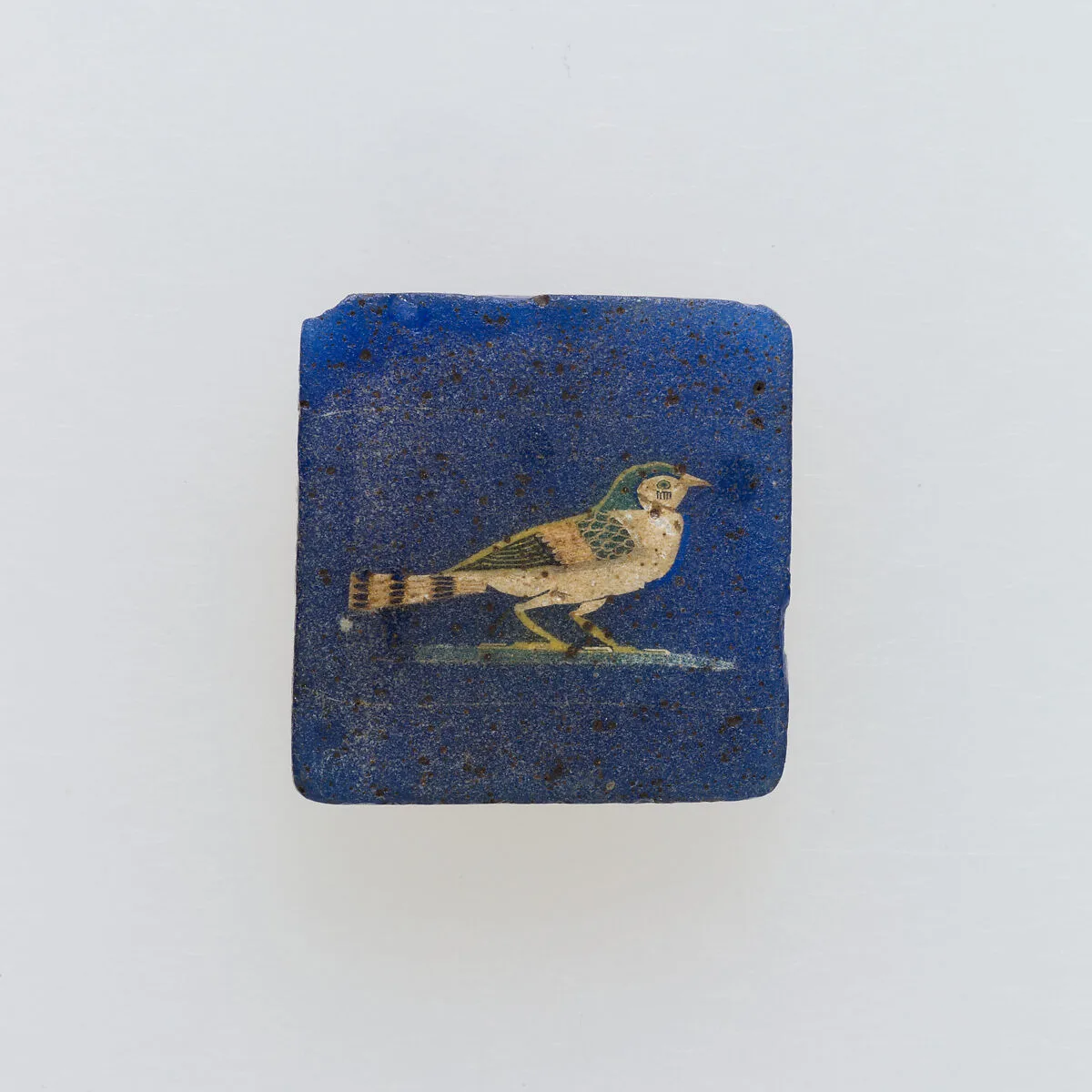 A swallow, a solar symbol, in an rectangular inlay — Unknown