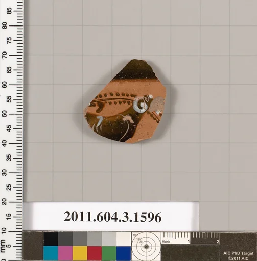 Terracotta fragment of a kylix: Band cup (drinking cup)