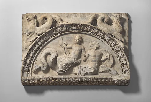 Marble lunette with Nereid riding Triton