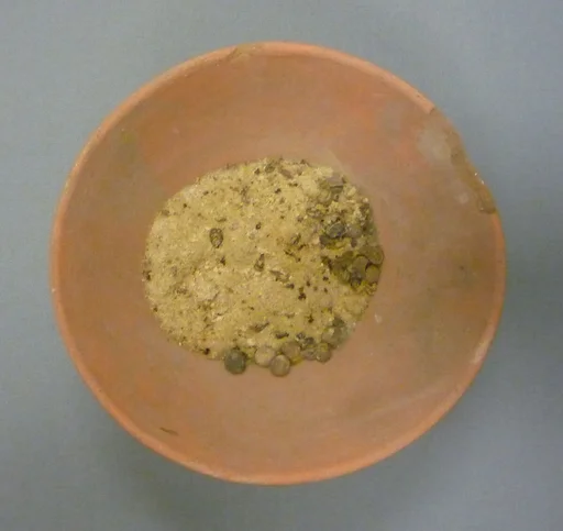 Bowl of Jujube Berries and Sand