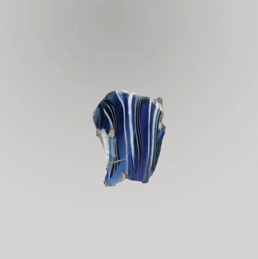 Glass mosaic ribbed bowl fragment