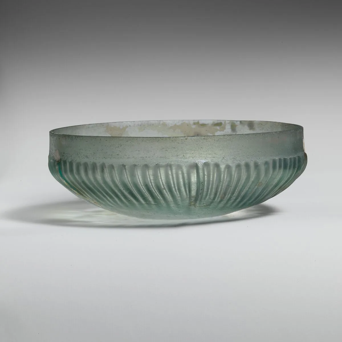 Glass ribbed bowl — Unknown