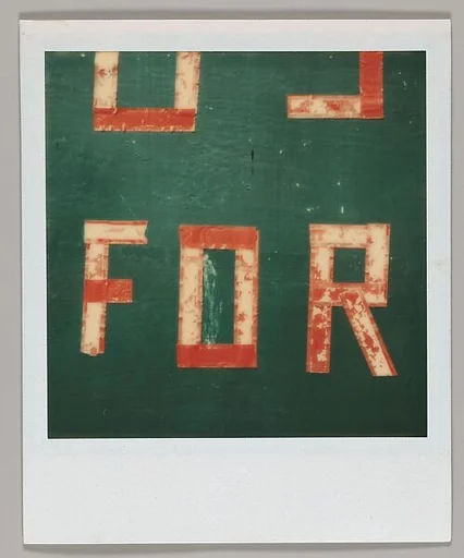 [Sign Lettering: "FOR"]