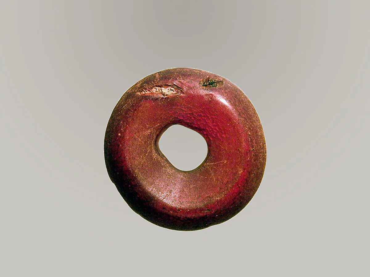 Pierced disk, perhaps from an earring or fibula (safety pin) — Unknown