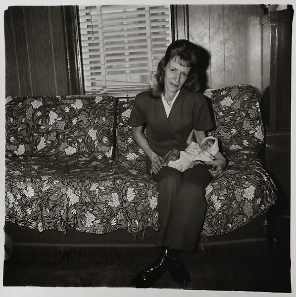 A woman with her baby monkey, N.J. — Diane Arbus|Neil Selkirk