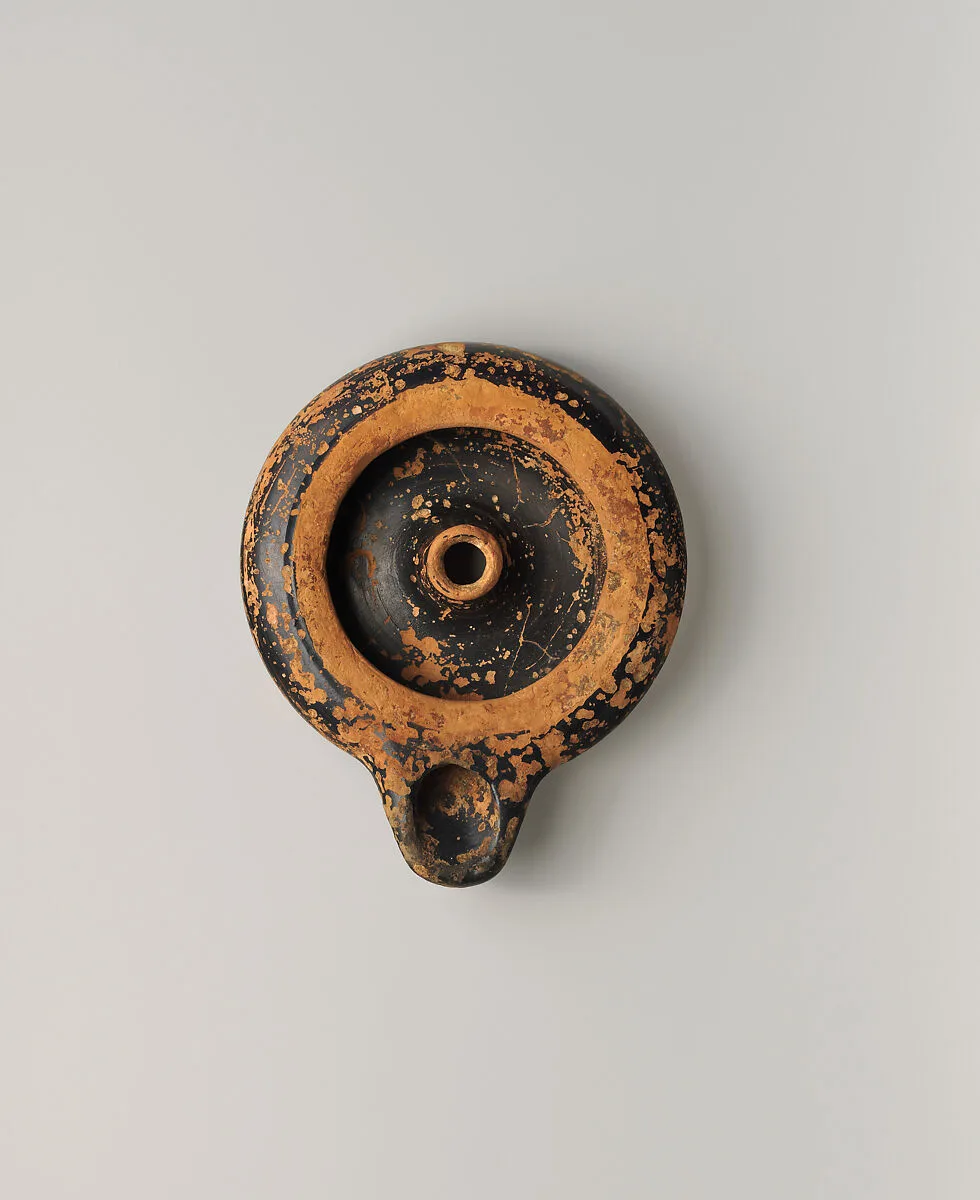 Terracotta oil lamp — Unknown
