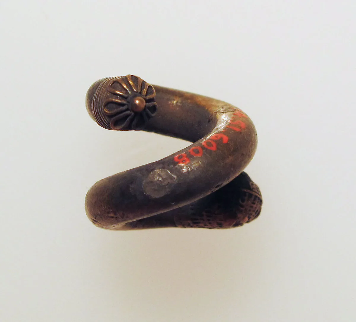 Earring, spiral with lion's head — Unknown