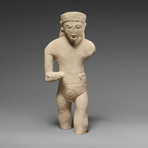 Limestone statuette of a male votary with Cypriot shorts and a diadem